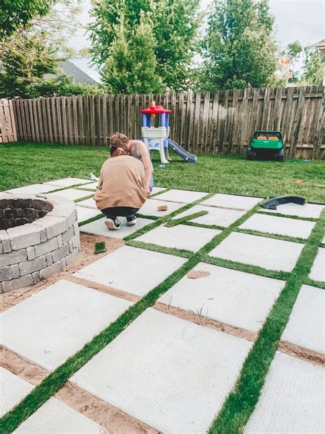 Diy Patio With Grass Between Pavers And A Fire Pit Diy Backyard