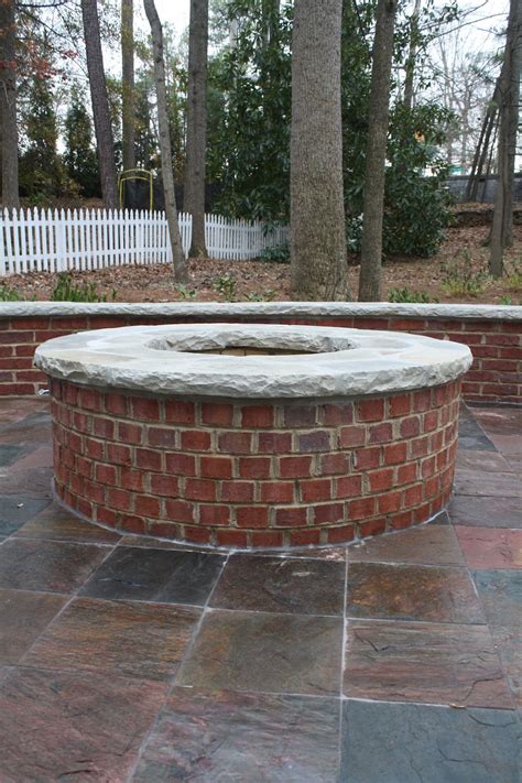 50 diy fire pit design ideas bright the dark and bored how to build a diy fire pit the family handyman best bricks for fire pit how to build in your backyard i used kit how to build a diy fire pit for only 60 keeping it simple brick fire pit on budget diy outdoor fireplace 27 best diy firepit ideas and designs for 2020. Red Brick Firepit with Stone Cap | Brick fire pit, Garden ...