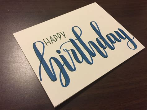 Happy birthday card in modern calligraphy and hand drawn floral wreath. Happy birthday card. Modern calligraphy. # ...