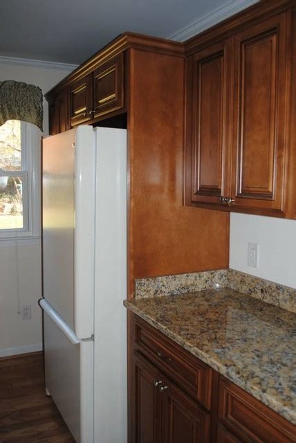 Maybe you would like to learn more about one of these? Deep Cabinet Above the Refrigerator and a Wood Panel on ...
