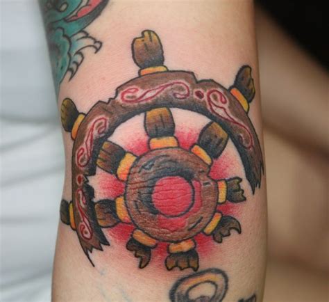 traditional sailor elbow tattoos ships wheel elbow tattoo elbow tattoos tattoos tattoos for guys