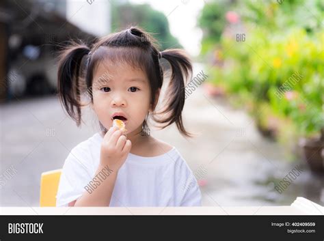 Girl Forced Eat Fruit Image And Photo Free Trial Bigstock
