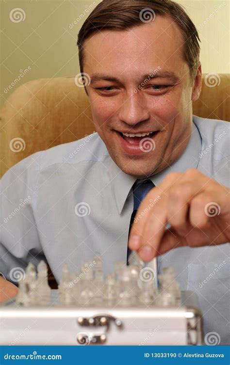 Smiling Businessman Playing Chess Stock Photo Image Of Competition
