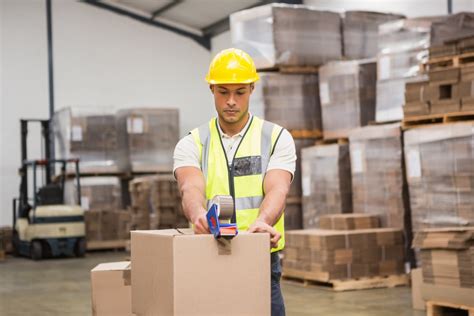 Warehouse worker preparing a shipment - Pakall - Leaders in Quality Packaging