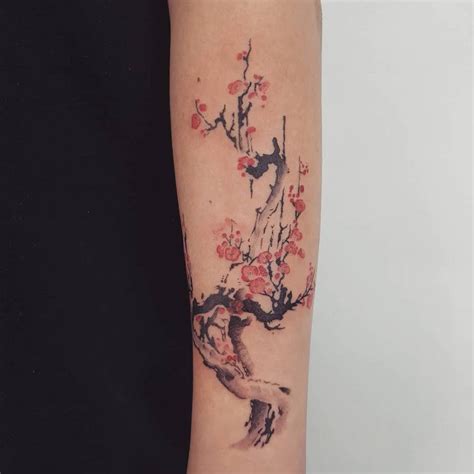 Cherry Blossom Tattoo On The Left Forearm