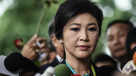 thailand s ex pm yingluck shinawatra sentenced in absentia to five years in prison