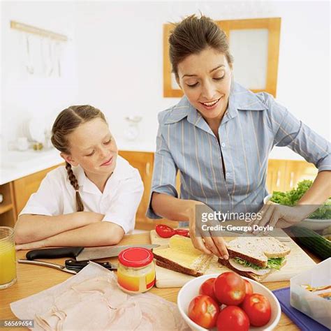 mom making sandwiches photos and premium high res pictures getty images