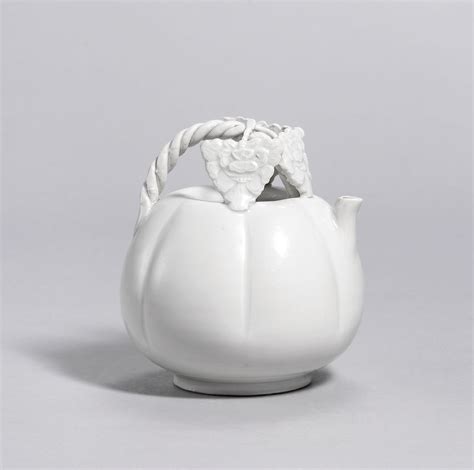 DING WHITE GLAZED MELON SHAPED EWER FIVE DYNASTIES NORTHERN SONG