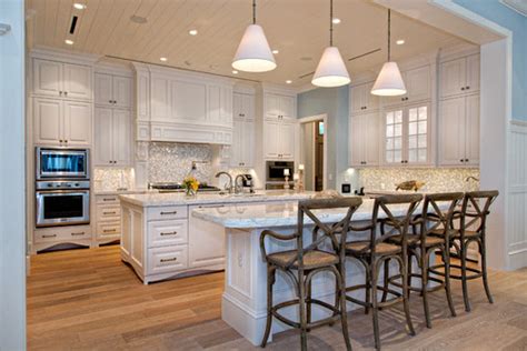 Lastly, kitchen cabinet uppers either need to be shortened or the space between the upper and the counter need to be reduced. Are these 10 ft. ceilings? The cabinets are gorgeous!