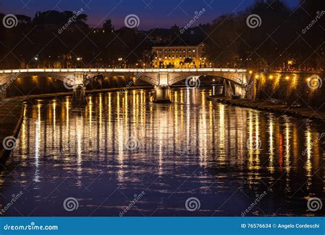 Tiber River Bridge And Reflections On Water Night Rome Italy Stock