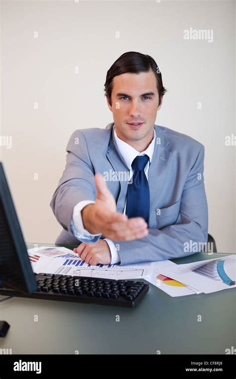 Businessman Offering His Hand Stock Photo Alamy
