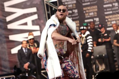 conor mcgregor wears outrageous polar bear fur coat and goes shirtless for floyd mayweather head