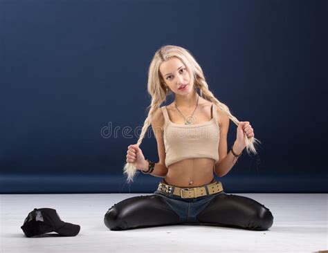 Attractive Blond Woman Sitting On Her Knees Stock Photo Image Of Pigtails Hipster