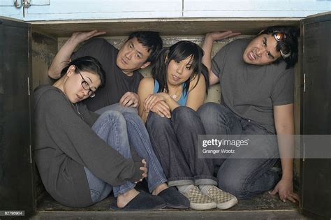 Multiethnic Group Squeezed In Small Space Photo Getty Images