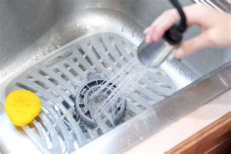 What causes a dishwasher to smell of melted plastic? How To Clean A Smelly Dishwasher | Cleaning your ...