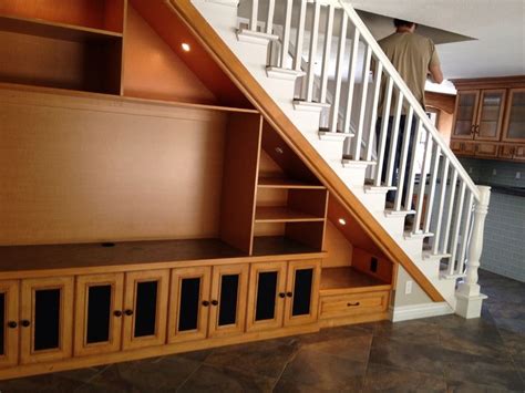 Type the questions in the space provided. Solution for Open Space under Staircase: This is double sided with entertainment center on one ...