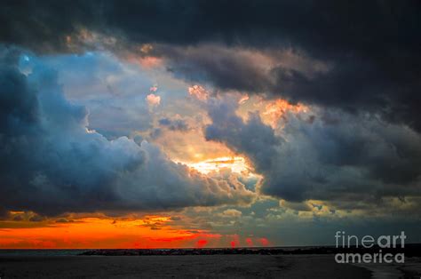 Sunset Through Grey Storm Clouds Photograph By Daya Tom Pixels