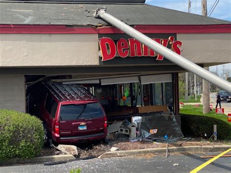 denny s arlington heights crash chevy suv crashes through wall while no customers were inside