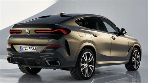 The x6 was marketed as a sports activity coupé (sac) by bmw, referencing its sloping rear roof design. BMW X6 M50d will take on the Audi SQ8 TDI directly