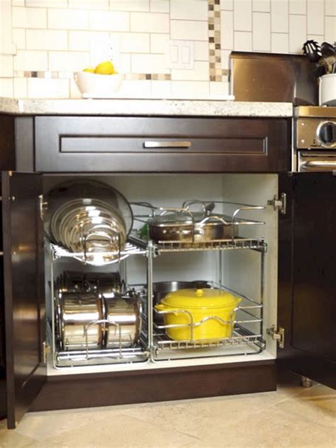 How can one organize smart storage spaces in the kitchen to accommodate everything? 44 Smart Kitchen Cabinet Organization Ideas - GODIYGO.COM
