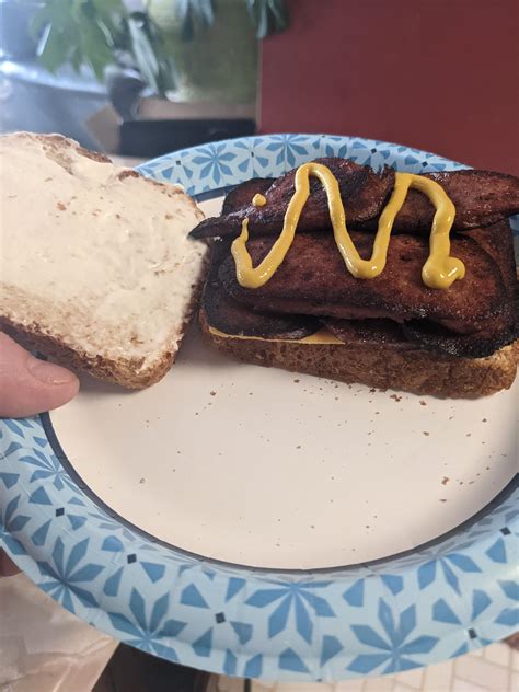 Armour Treet on white! lightly toasted with mayo mustard and an