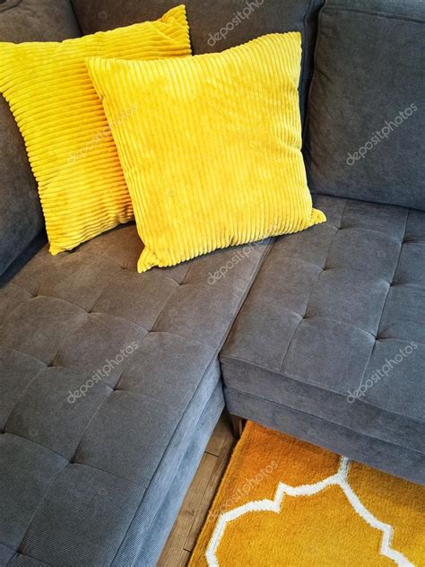 Gray Sofa With Yellow Cushions — Stock Photo © Studiolightandshade