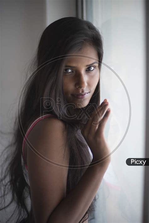 Image Of Portrait Of An Attractive Young Brunette Dark Skinned Indian