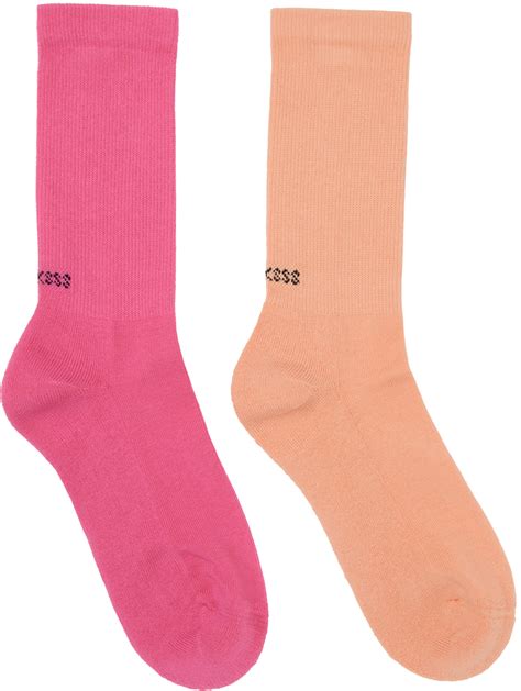 socksss two pack orange and pink socks ssense