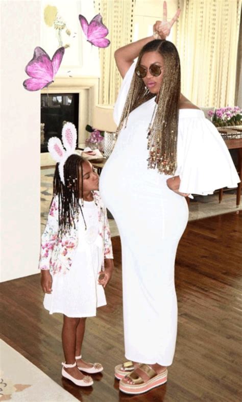 Blue Ivy Kisses Beyonces Baby Bump In Sweet Easter Photos