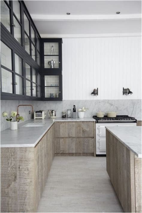They are so minimalist that they don't even have visible cabinet pulls or handles! 7 Amazing Scandinavian Kitchens to Inspire You - DIAMOND INTERIORS