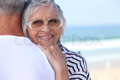 Elderly Couple Hugging Stock Image Colourbox