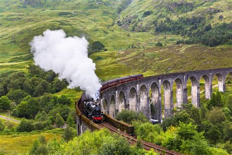 Glenfinnan Railway Viaduct In Scotland With The Jacobite Steam Train