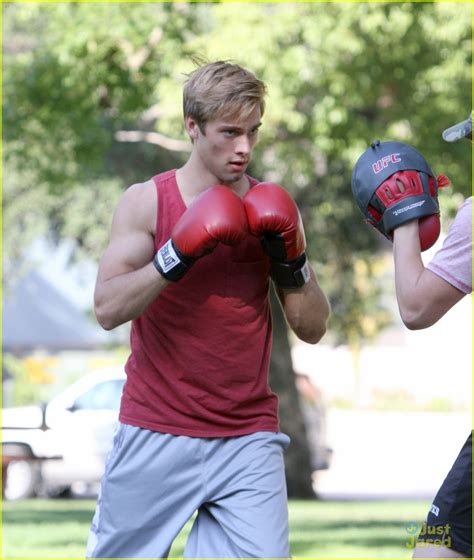 Austin North Shows Off His Buff Biceps While Boxing In The Park Photo