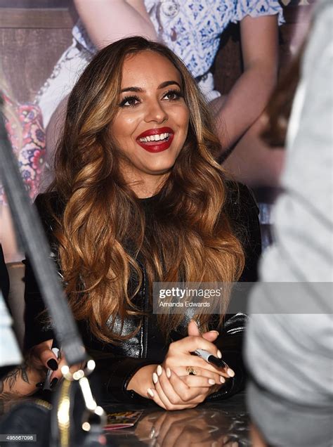 Singer Jade Thirlwall Of The Girl Band Little Mix Signs Copies Of The