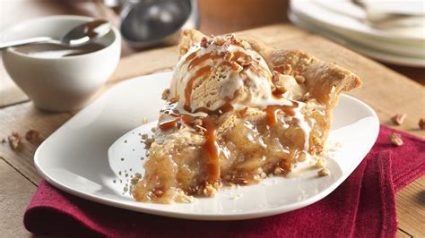 It's layered with a tender flaky crust, a spiced juicy apple pie filling, and it's finished with a crisp buttery crumb topping and a sweet vanilla glaze. Caramel Apple Pie with Pecans recipe from Pillsbury.com