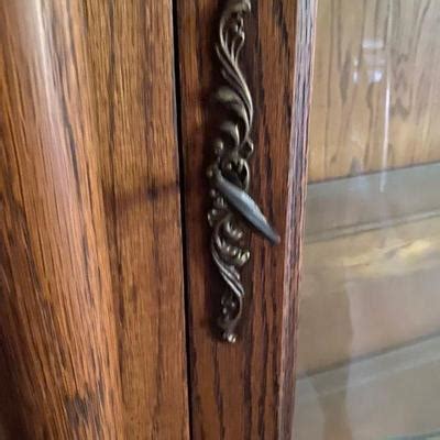 Glass curio cabinets glass cabinet doors glass shelves glass doors china cabinets display cabinets living room furniture home all glass curio with high gloss black base. Antique Horner Brothers Lion Head, Claw feet, Bowed Glass ...