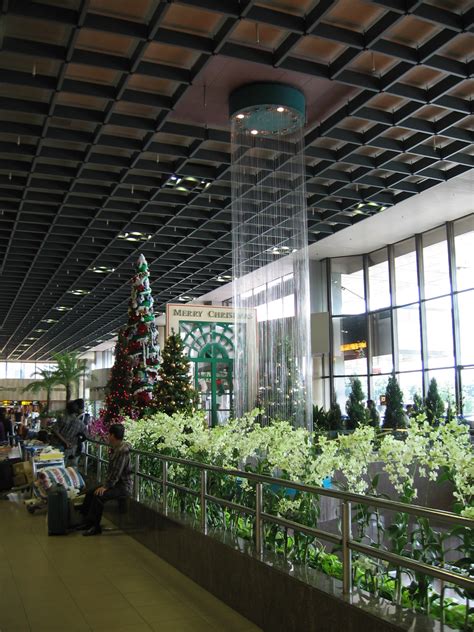 Singapore changi airport's terminal 3 will have a flat but intriguing roof consisting of many skylights allowing natural light into the terminal building. File:Singapore Changi Airport, Terminal 1, Departure Hall ...