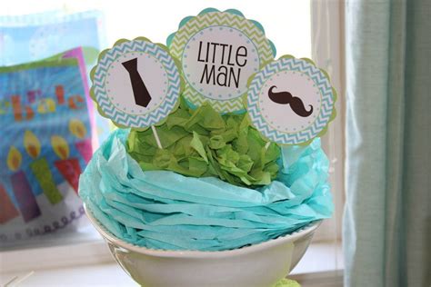 You could bake a cake that looks like a shirt with a tie on it, create a table napkin into a bow tie. 5M Creations: Little Man Mustache Bash Baby Shower