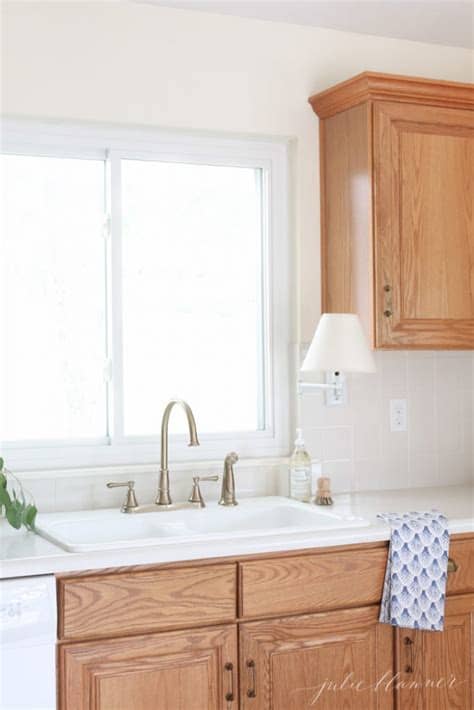 Should i paint or stain oak kitchen cabinets to uodate? Updating a Kitchen with Oak Cabinets {Without Painting Them}