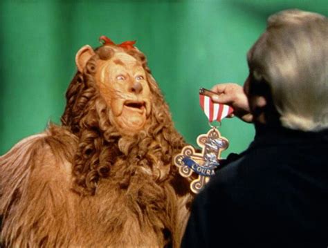 The Lion Gets His Medal For Courage Wizard Of Oz Movie Wizard Of Oz