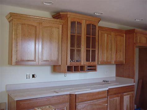 I was having a hard time figuring out how to miter the crown at the funky angles resulting from the weird cabinet shape. How to Cut Crown Molding for Kitchen Cabinets | eHow UK