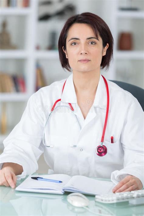 Portrait Young Female Doctor In Office Stock Image Image Of Holding