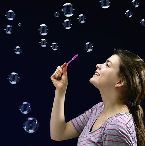 Woman Blowing Bubbles Photograph By Kevin Curtis Pixels