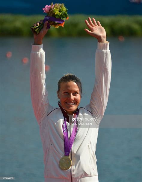 Hungarys Danuta Kozak Poses On The Podium With Her Gold Medal Won In