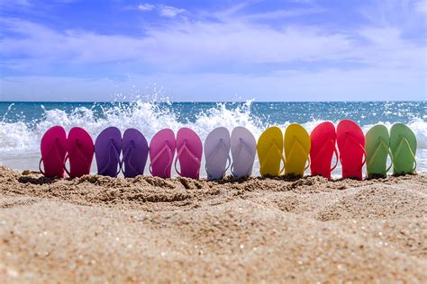 Rainbow Of Flip Flops On The Beach Photograph By Teri Virbickis
