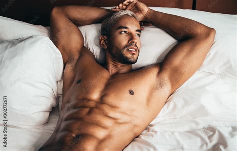 Sexy Man In Bed In Hotel Room Stock Photo Adobe Stock