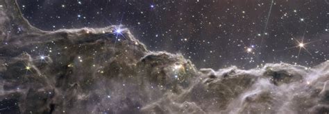 Webb Reveals Cosmic Cliffs A Glittering Landscape Of Star Birth