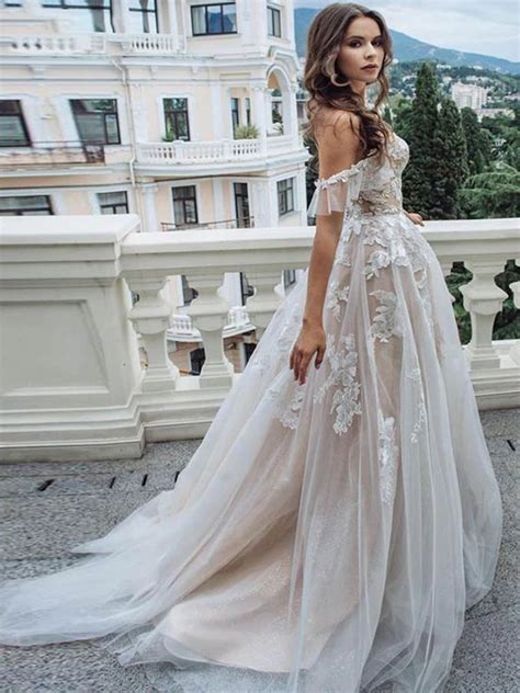 A regular single or double strand necklace can frame out your entire bridal look with simplicity. Off-the-Shoulder Lace Tulle A-Line Wedding Dresses in 2020 ...