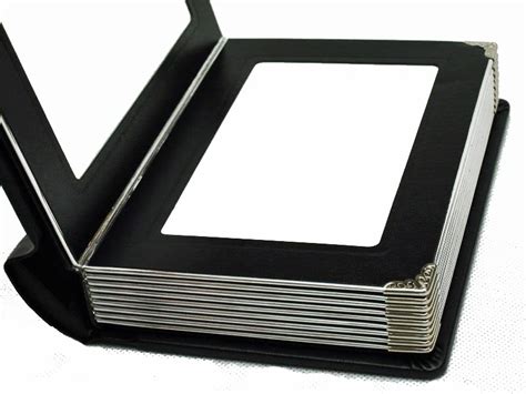 Dimensions of the 400 4x6 photo picture album. Premium 4x6 Professional Wedding Album with Silver Edged Mylar Pages by Regal