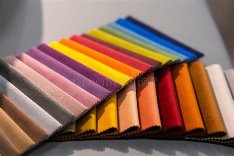 Catalog Of Multi Colored Fabric Samples Textile Industry Background
